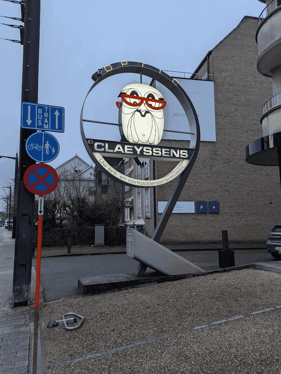 Art Nouveau owl sign on a Ghent opticians