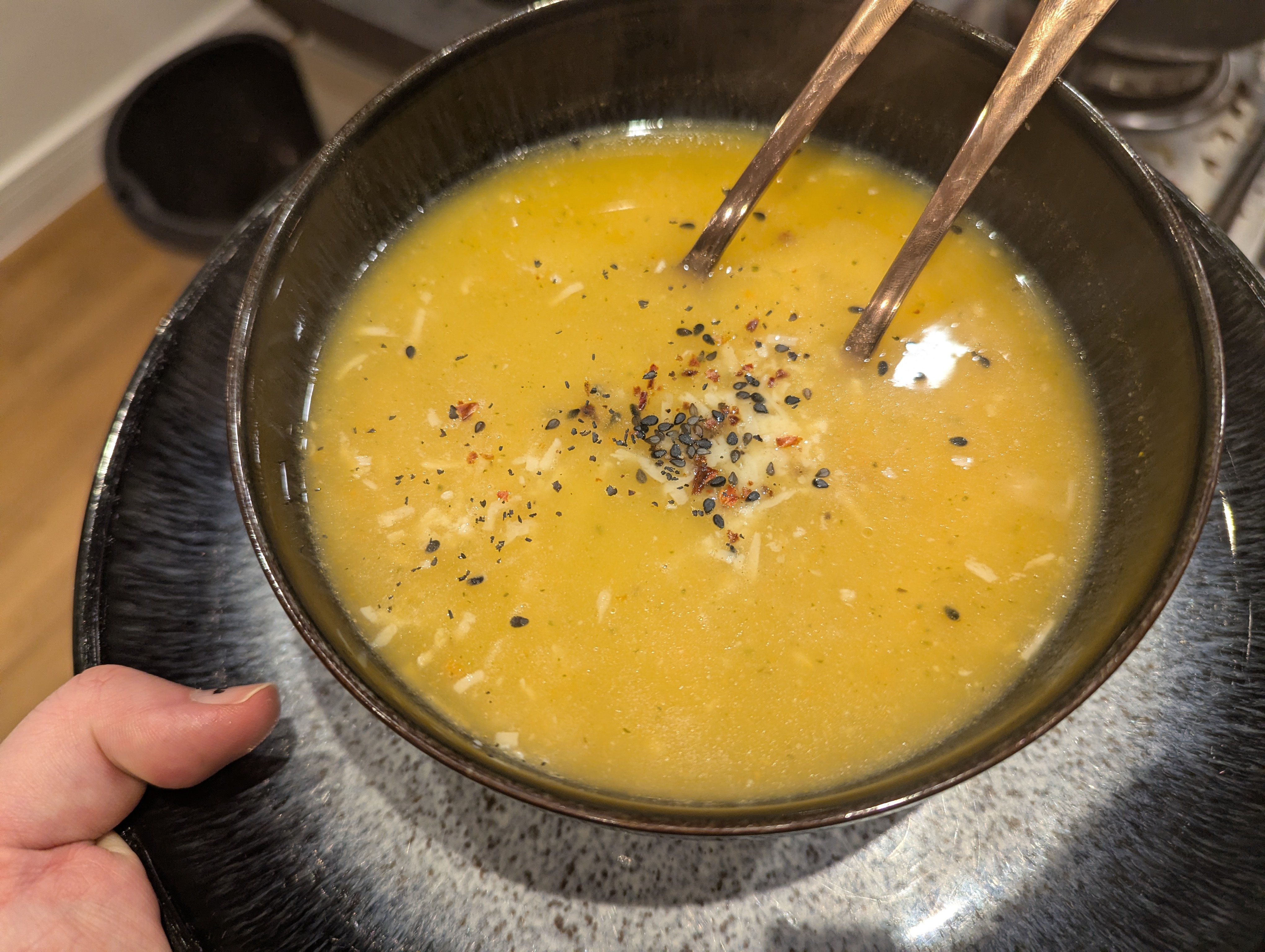 Pastina soup with pepper and parmesan