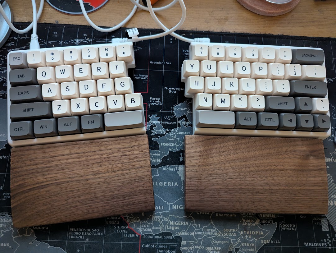 NocFree split keyboard with wooden wrist rests